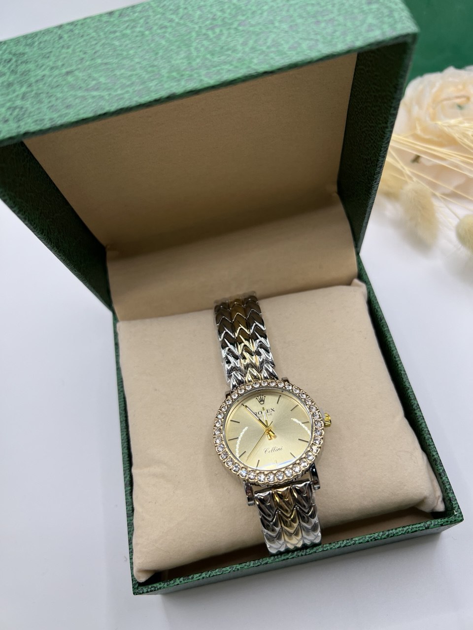  Montre Rolex en acier inoxydable doré et argenté T