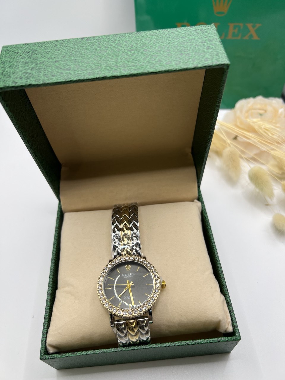 Montre Rolex noire dorée & argentéeT